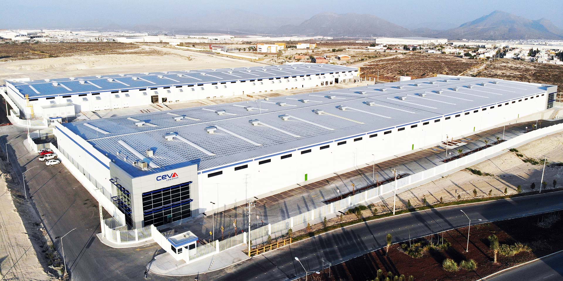 Drone photograph of a DAVISA industrial park building operated by CEVA Logistics. One of our success stories.