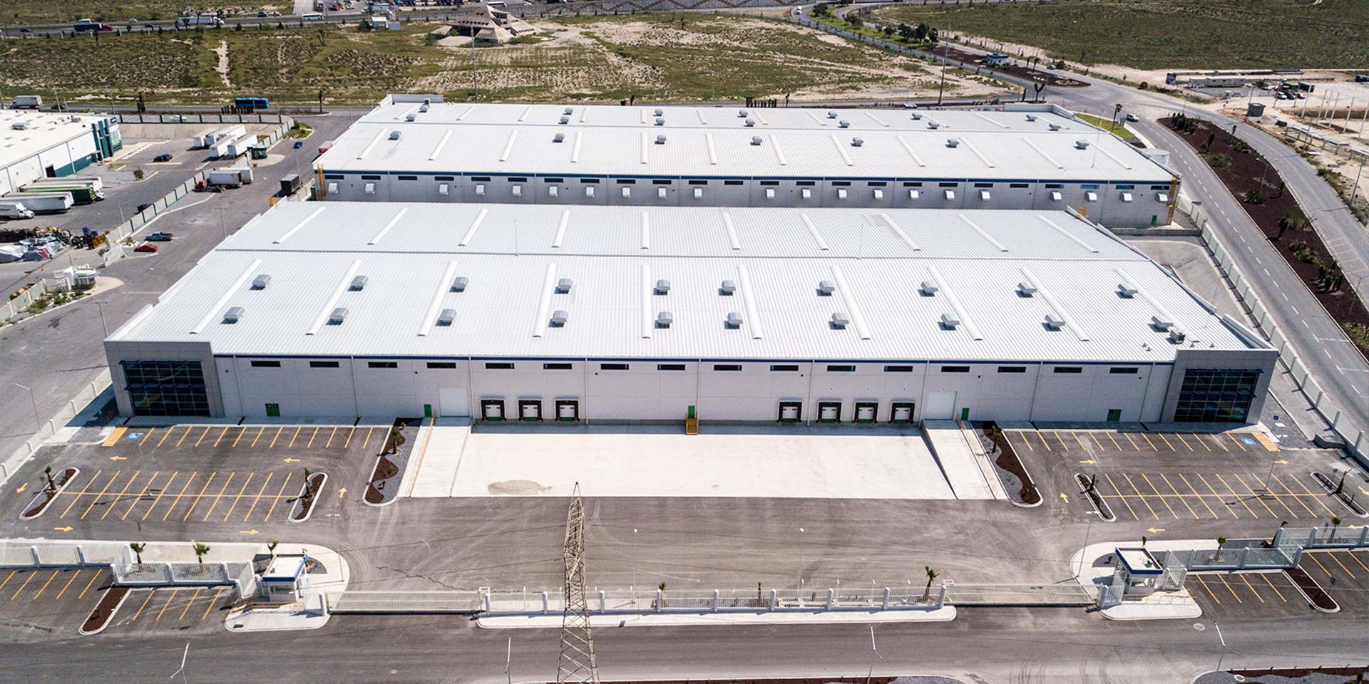 Drone photograph of a DAVISA industrial park building operated by Cargoquin. One of our success stories.