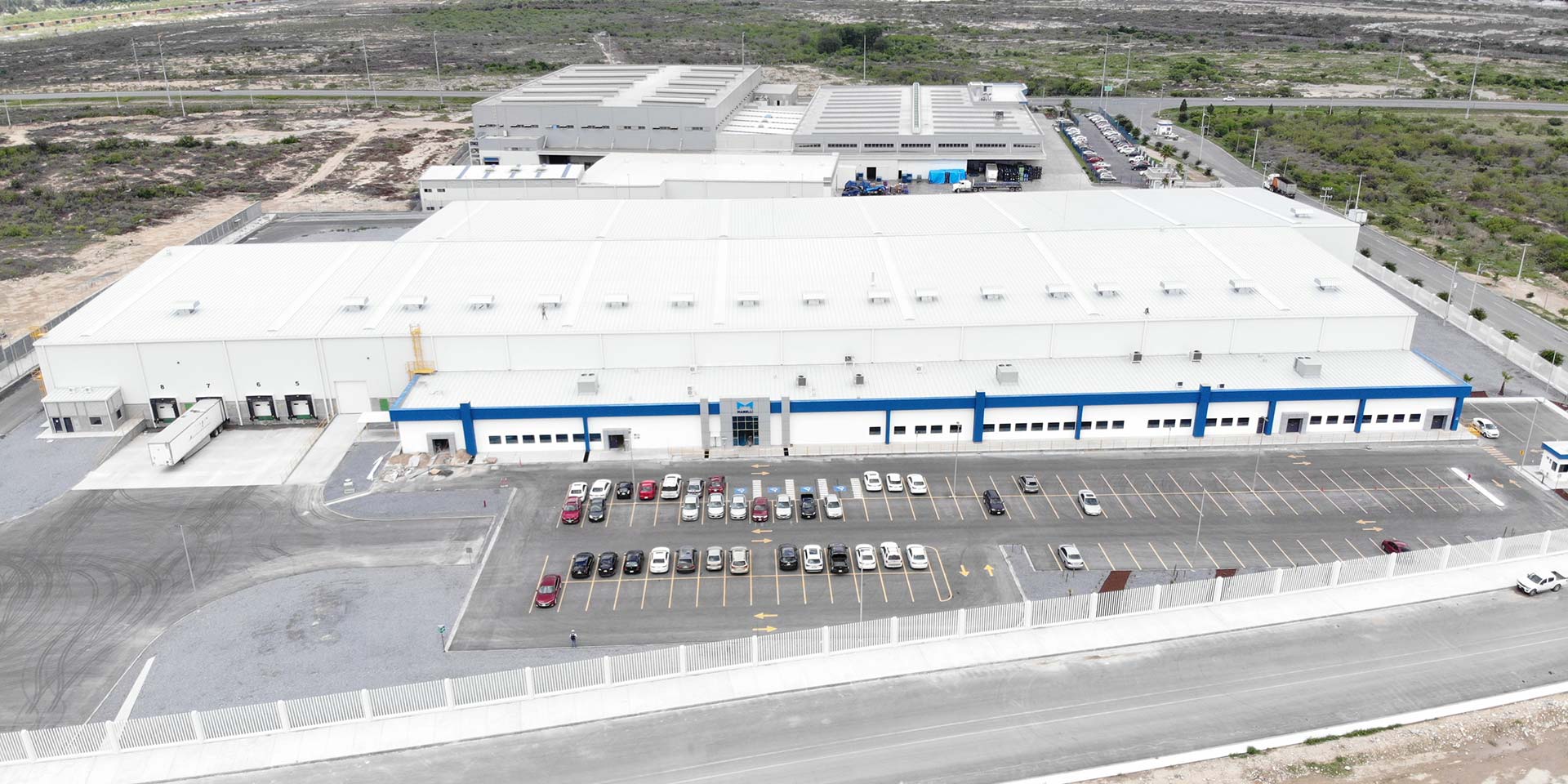 Drone photograph of a DAVISA industrial park building operated by Marelli. One of our success stories.