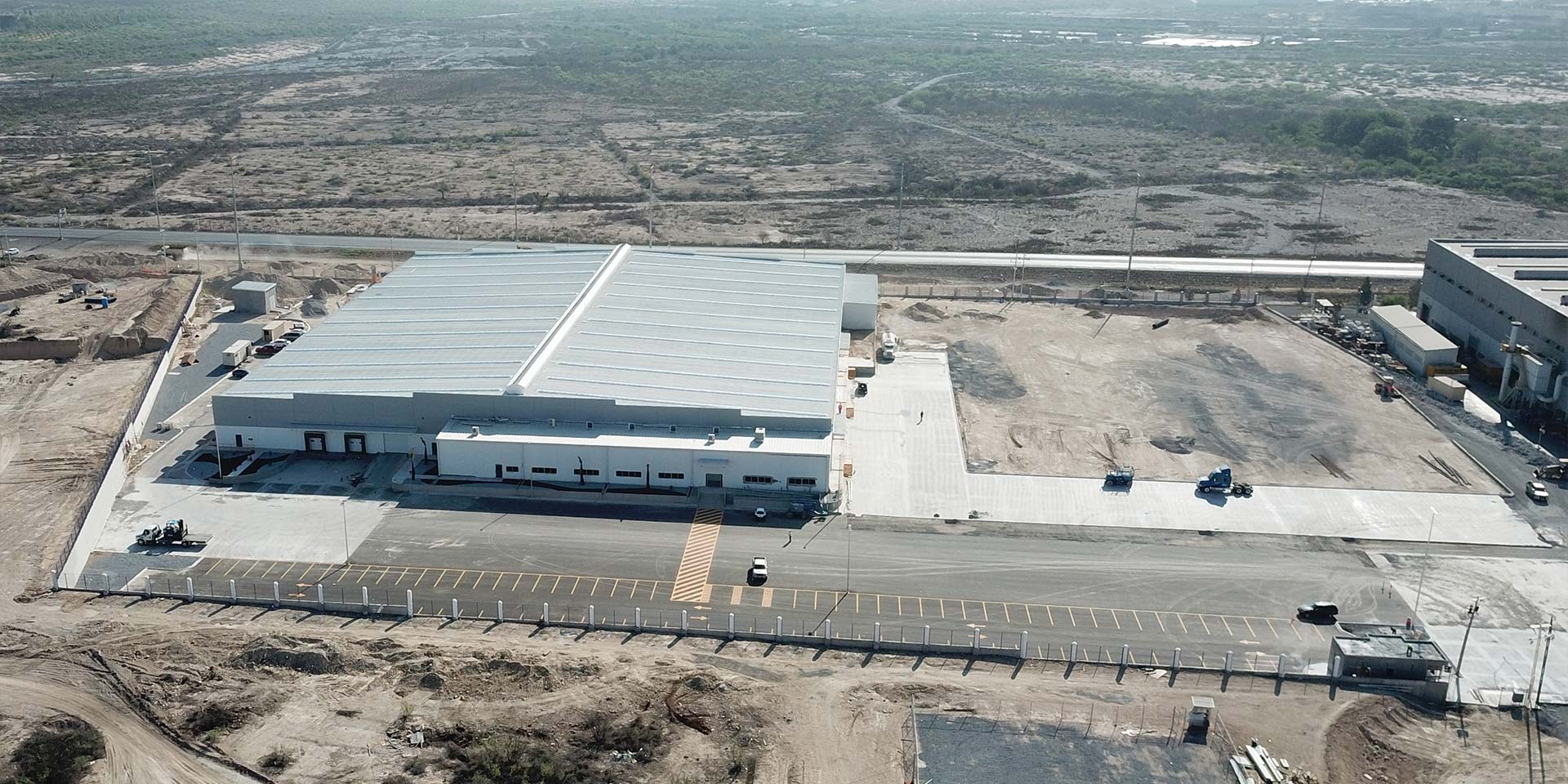 Drone photograph of a DAVISA industrial park building operated by Kodaco